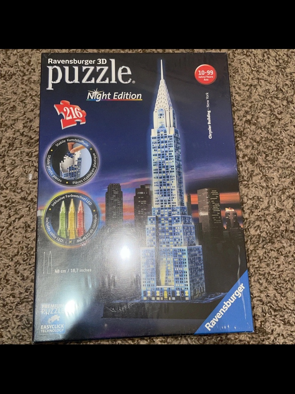 Ravensburger 3D Puzzle Night Edition - Blue and Yellow Cityscape